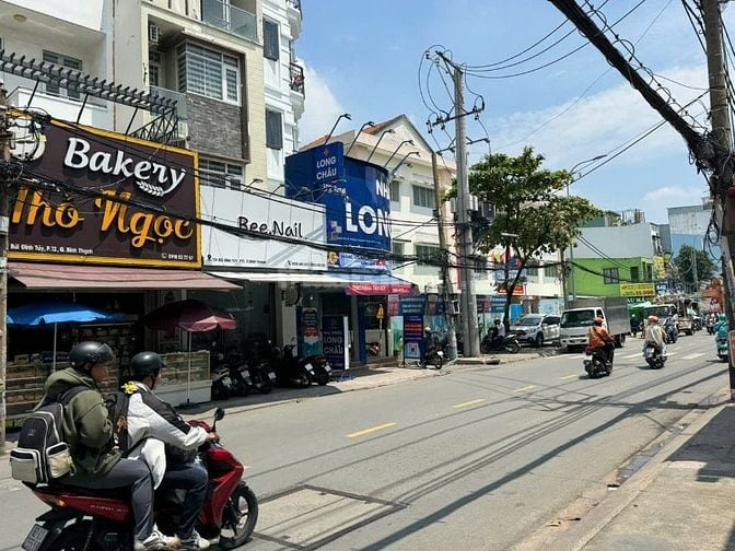 Bán nhà MT Bùi Đình Tuý ( đoạn đẹp ) P12 BT. 4.72x20m 5 Tầng HĐT 45Tr.