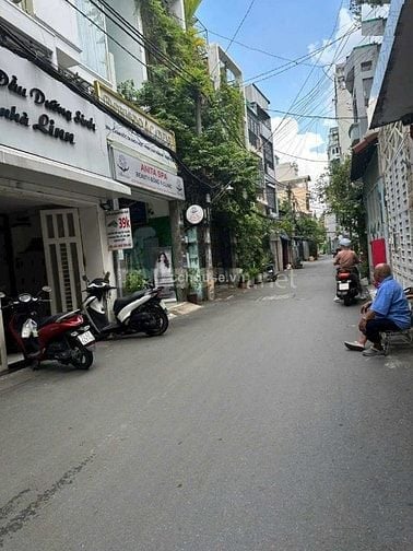 Nhà HXH 345 Trần Hưng Đạo, Q1. DT 4x20m, 4 tầng
