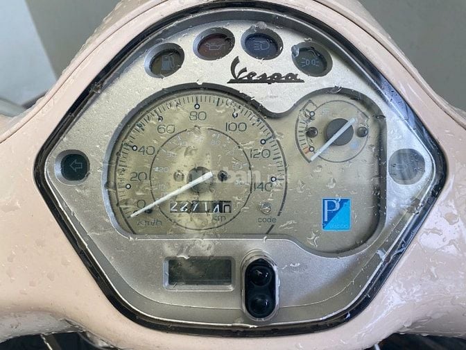 Bán Piaggio Vespa Lx chính chủ màu vàng kem