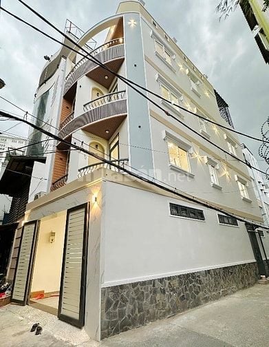 Nhà 4 Lầu DT:4,25x13m Cao cấp góc 3 mặt hẻm xe hơi Nguyễn Đình Chính