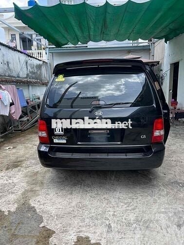 Kia Carnival 2009 GS 2.5 AT - 100000 km