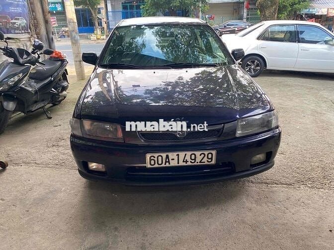 cần bán xe mada 323 số sàn xe gia đình máy 1.6