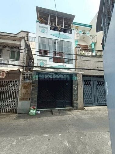 Bán nhà đối diện chợ Lê Văn Sỹ 