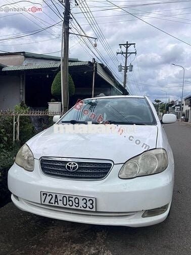 Toyota Corolla Altis 1.8G MT 2004 trắng đẹp