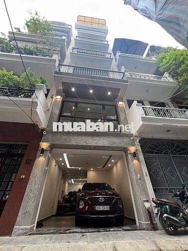 Bán nhà Mặt phố Dương Khuê 100m2 7 tầng Thang máy, 2 mặt đường, sầm uấ