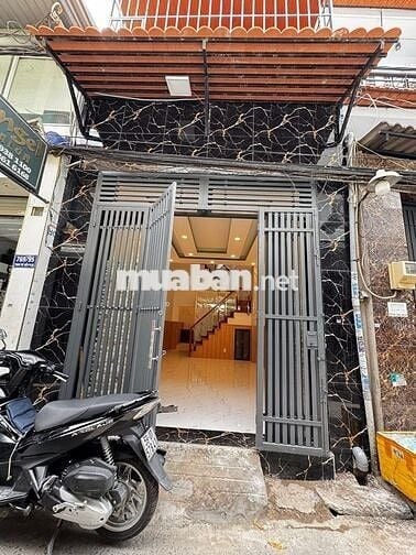 Bán nhà ngay Đ. Quốc lộ 50, 1 trệt, 1 lầu. Giá 1 tỷ 325 triệu, Sổ sẵn.
