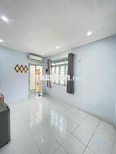 Phòng trọ 15m2 đường Nơ Trang Long đầy đủ máy lạnh tủ lạnh