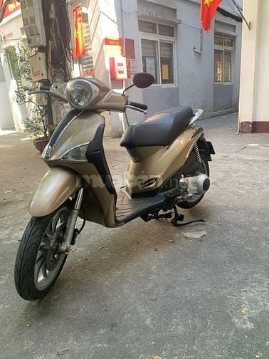 Cần bán xe Piaggio Liberty Việt Nam ăn ít xăng màu kaki biển 29D1