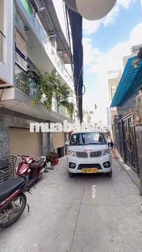 CĂN HỘ 4 TẦNG 7PN, Ô TÔ ĐỖ CHỬA QUẬN 7, DÒNG TIỀN 250tr/NĂM