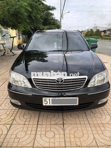 Toyota Camry 3.0V model 2004 màu đen cọp