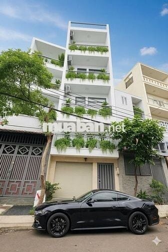 Mặt tiền 5 lầu Nguyễn Trường Tộ đang hoàn thiện mặt đường mới toanh