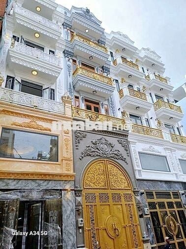 Nhà mới 100% ( 4 x 17 có 3 lầu 5pn 5wc sân thượng)