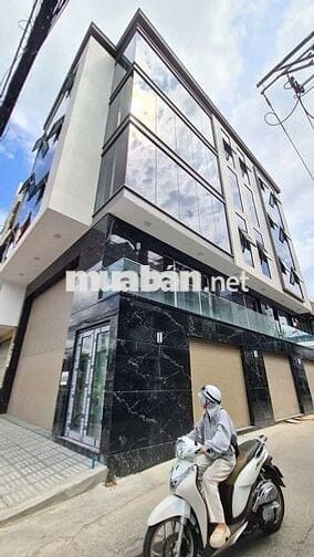 TÒA NHÀ LÔ GÓC MỚI 100% 8X20M 1 TRỆT 4 LẦU CÓ THANG MÁY