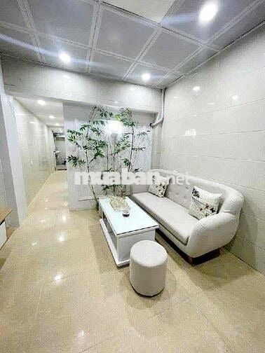 Tập thể 50 m2 sổ đỏ tầng 1 mặt ngõ thông phố Bùi ngọc Dương 5 m ra oto