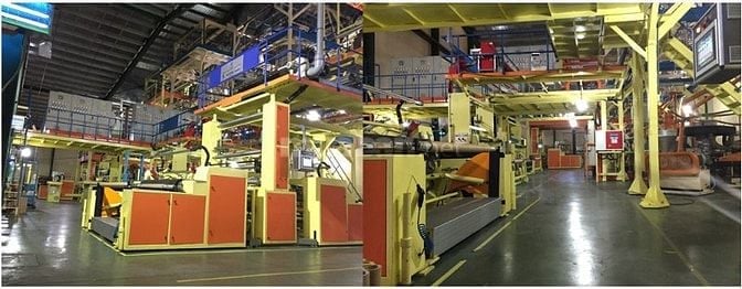 Công nhân sản xuất và phụ kho trộn nhựa