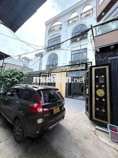 Bán nhà đẹp ngang 9x10m, 4 tầng, sân vườn, hxh 8m Emart Phan Huy Ích