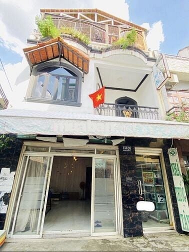 Chính chủ Bán Nhà Mặt tiền đầu hẻm lớn,Quận 7,Sổ hồng riêng