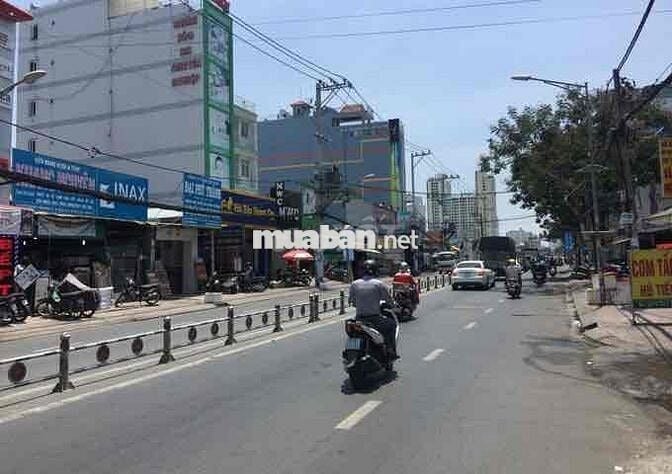 NHÀ XINH CÁCH Mặt Tiền 30m. Sát Lê văn lương . kDC HIm Lam. Trục đường