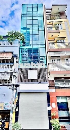 SIÊU PHẨM NHÀ MẶT TIỀN ỐP KÍNH - 6 TẦNG – CÓ THANG MÁY– DTSD 436m2