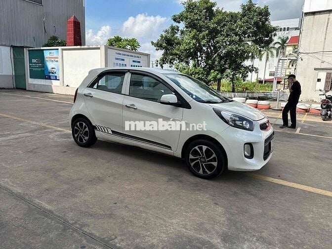 Kia Morning 2015 1.25 MT mua về chỉ việc chạy