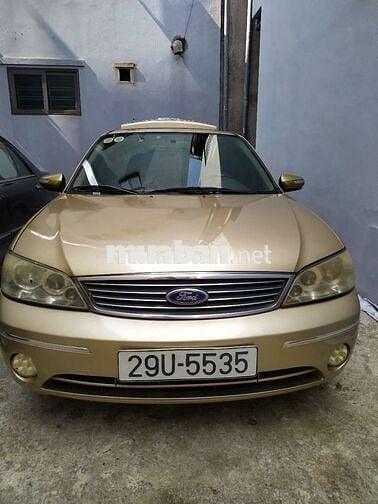 Đổi xe cần bán ford laser 2004 GHIA 1.8 AT.