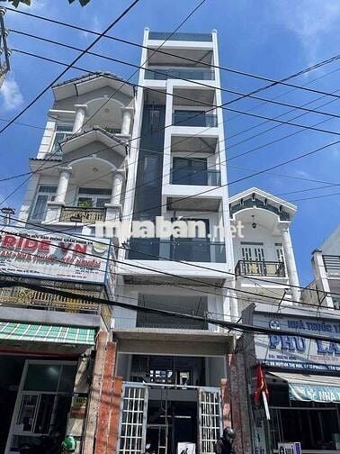 nhà mt ngay chợ hạt điều- huỳnh thị hai 6lầu. 12,5tỷ