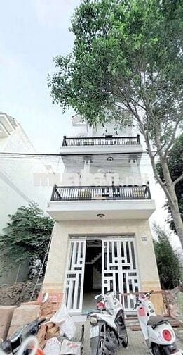 Nhà mới 2 lầu 4pn KDC Hồng Loan