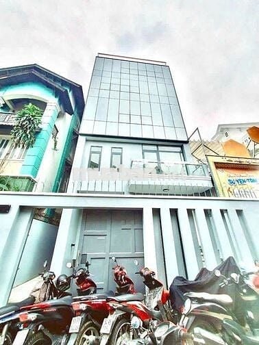 SIÊU PHẨM TOÀ NHÀ ỐP KÍNH 309F Nguyễn Văn Trỗi - 8x18m 4 tầng 720m sàn