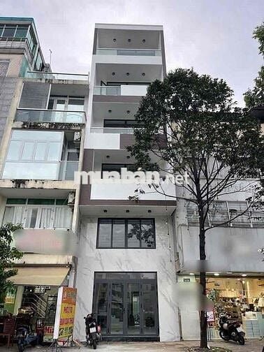 Cho thuê nhà 1 trệt 4 lầu 5pn 5wc 2 mặt tiền ở Trường Sa Q3