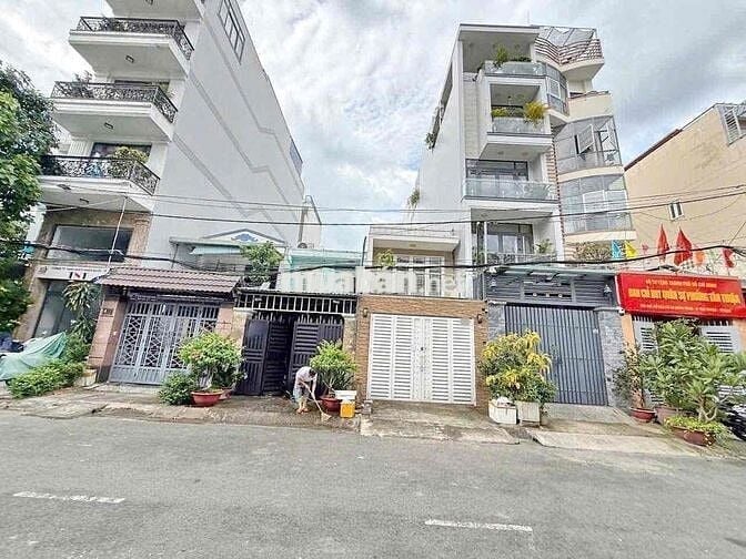 BÁN NHÀ MẶT TIỀN 4m X 21m CƯ XÁ NGÂN HÀNG QUẬN 7