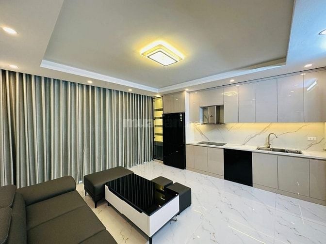 Bán nhà 7 tầng phố Võng Thị, 95m2, ngõ thông, ô tô đỗ cửa, kinh doanh