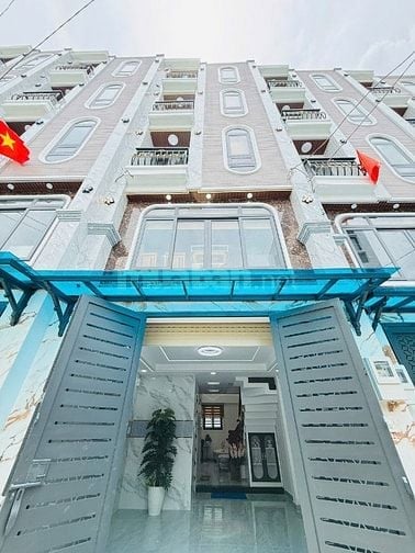 Khu nhà phố có thang máy ngay Mt nguyễn tư giàn sầm uất 4*12 - 5 lầu