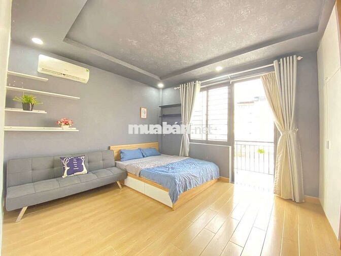 CHO THUÊ PHONG 35M2 FULL NT BAN CÔNG ĐƯỜNG NƠ TRANG LONG GẦN QUẬN 1