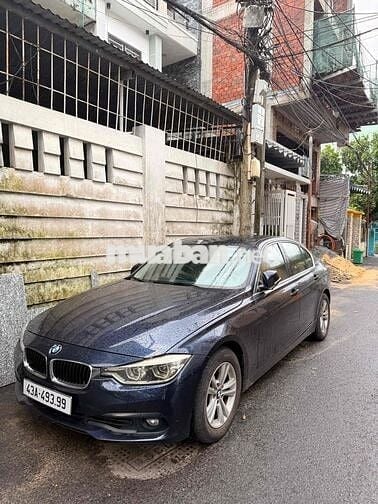 BMW 320i 2017 xanh dương đen