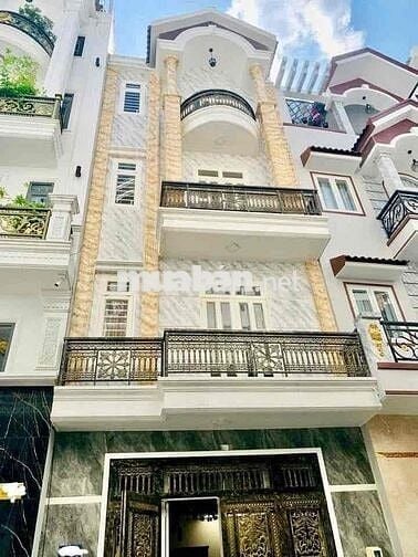 Cho thuê nhà đẹp 12tr/th DT: 5x 11 trệt 3 lầu  sân thượng có 4 phòng 4