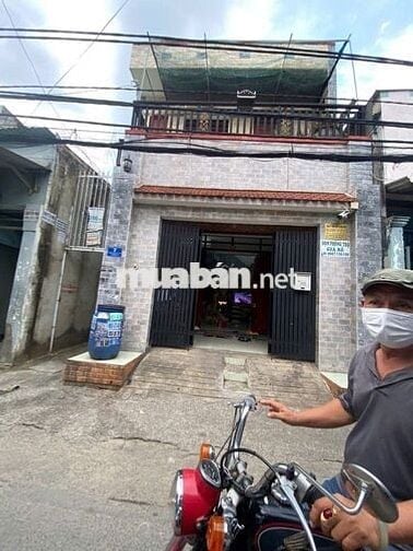 Nhà ở 164 m2 full thổ cư, 1 trệt 1 lầu và 15 phòng trọ phía sau, SHR