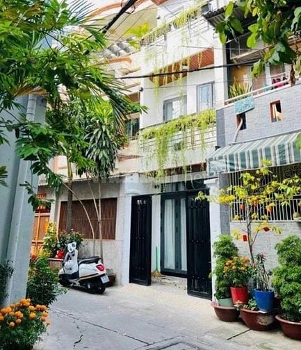 Nhà Nơ Trang Long 34.6m², xây 1 trệt 2 lầu. Hẻm 4m, sổ sẵn, gần chợ