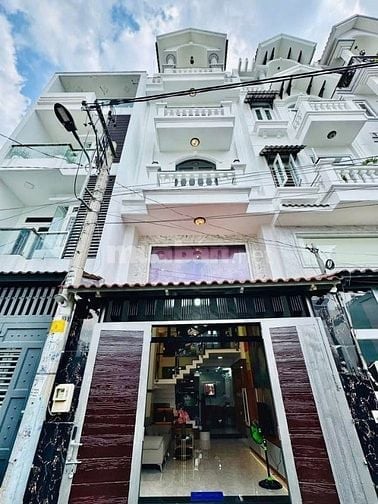 Kết cấu: trệt, lửng, 3 lầu, Gồm sân xe, phòng khách, bếp, 4 phòng ngủ,