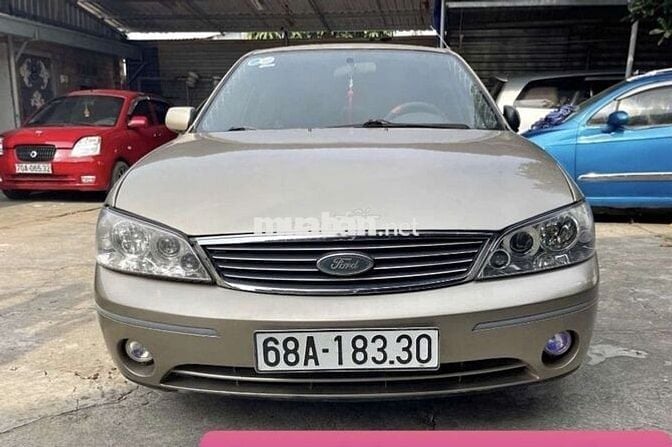 Ford Laser Vàng cát Số sàn