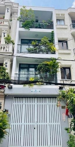 nhà 4 tầng 10 phòng.4,5x16m.HDT 50tr/tháng. Đường nhựa 8m sát mặt tiền