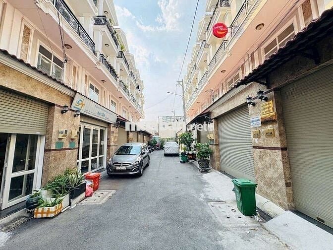 NHÀ 1 TRỆT LỬNG 2 LẦU GẦN NGÃ TƯ BÌNH PHƯỚC