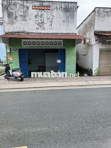 Mặt bằng kinh doanh + nhà ở ngay trung tâm thị trấn Củ Chi