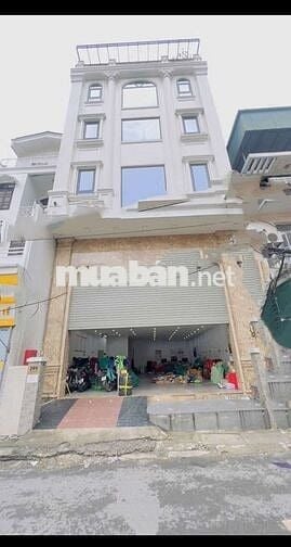 Tôi cần bán tòa nhà mặt phố Quan Nhân 8tầng thang máy full nội thất