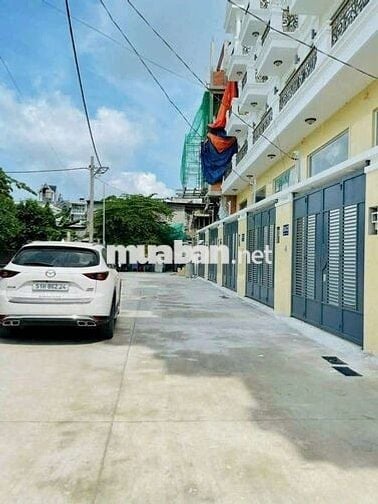 Nhà mới cho thuê 1 trệt 3 lầu, có 4pn,6wc. Hẻm xe hơi, không ngập nước