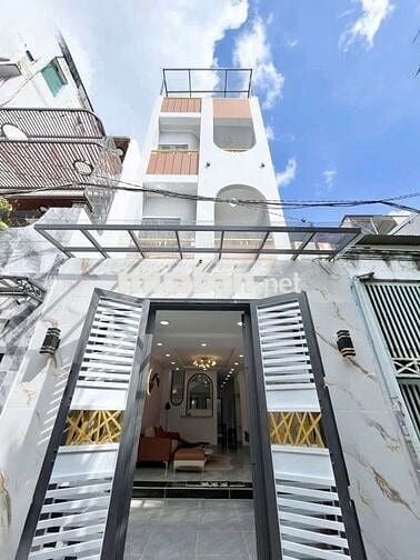 Giá rẻ chỉ: 8,3 tỷ Đẹp như mơ. HXH. 4 tầng. Sát Tân Hương. Dt: 4 x 18.