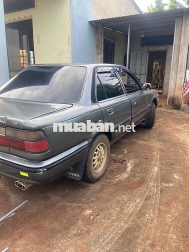 toi cần bán xe Toyota Corolla 1989 - 245000 km