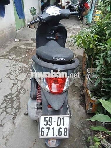 Liberty 3v ie. Biển số thành phố.