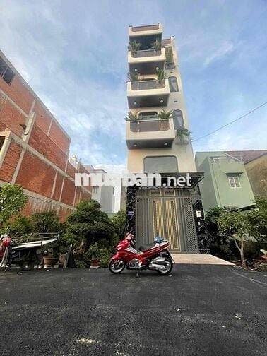 nhà phố trung tâm tân chánh hiệp( trung mỹ tây mới) sau lưng bvien q12