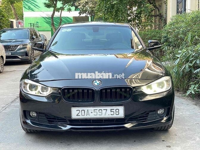 BMW 320i đời 2012 series 3 màu đen nội thất kem