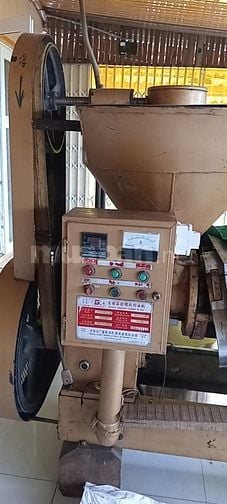 Máy ép dầu trục vít xuất xứ China cùng nồi lọc dầu